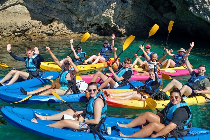 a group of people on a raft