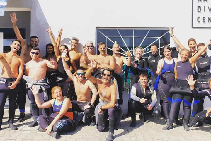 a group of people posing for a photo