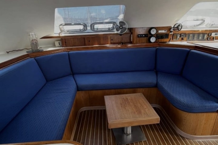 a living room with a blue chair