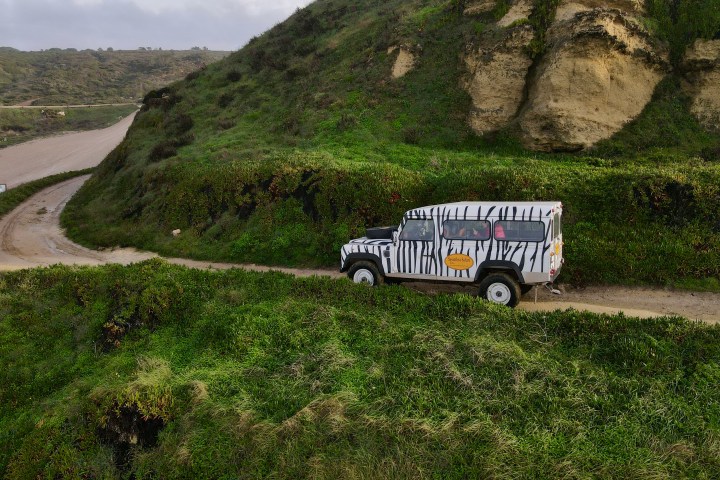 a truck that is sitting on the side of a mountain