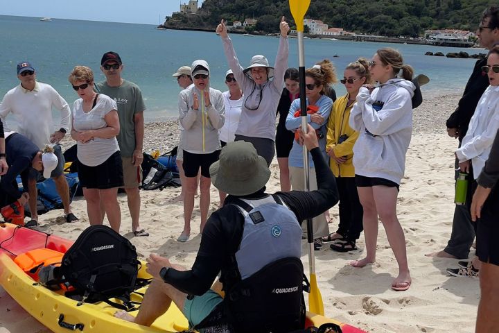 a group of people on a beach