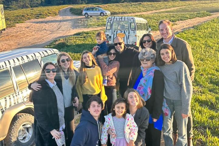 a group of people posing for the camera