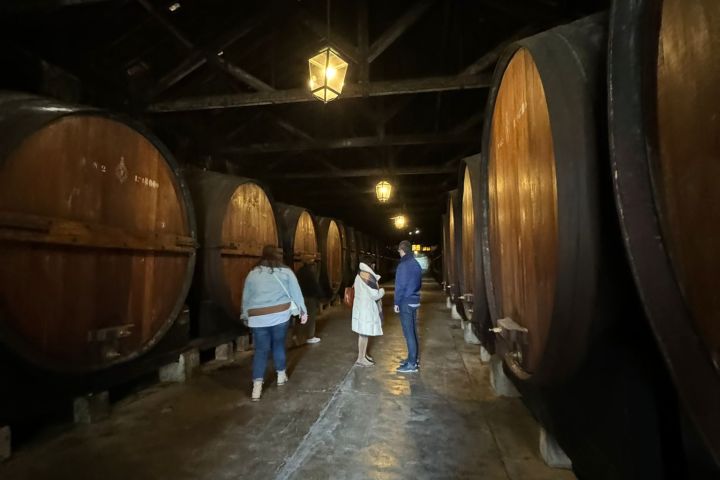 a group of people standing in a train station
