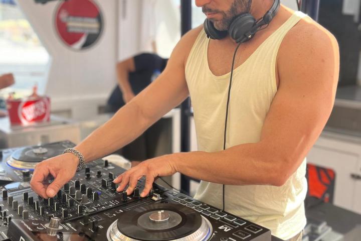 a man standing in front of a stove