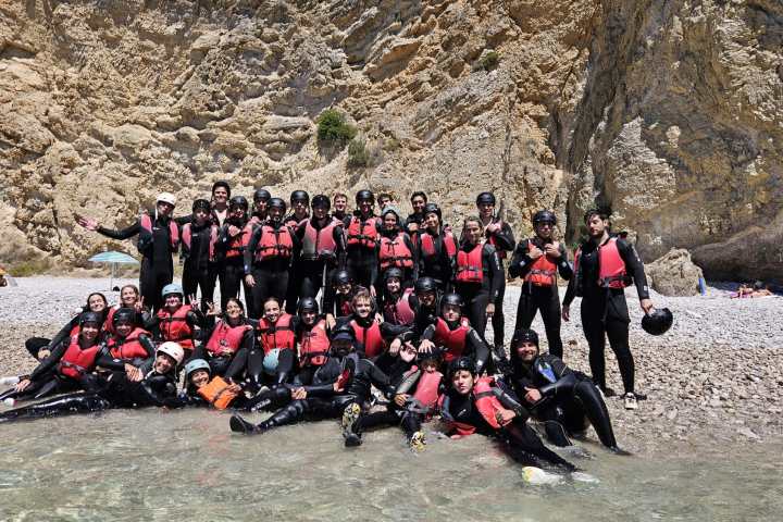 a group of people posing for the camera