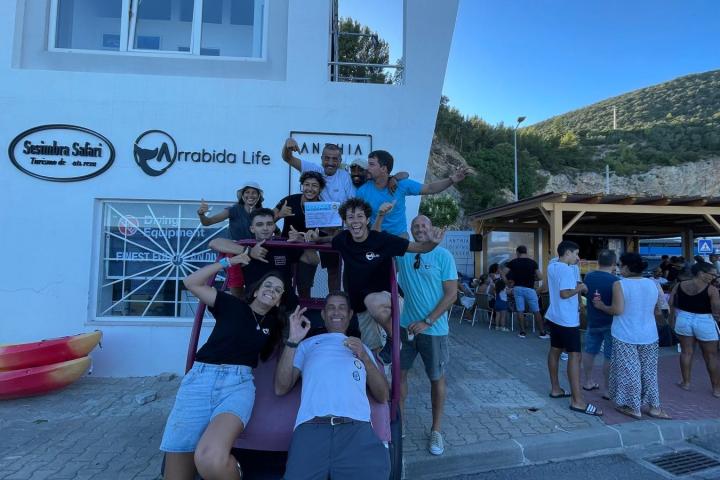 a group of people standing in front of a building