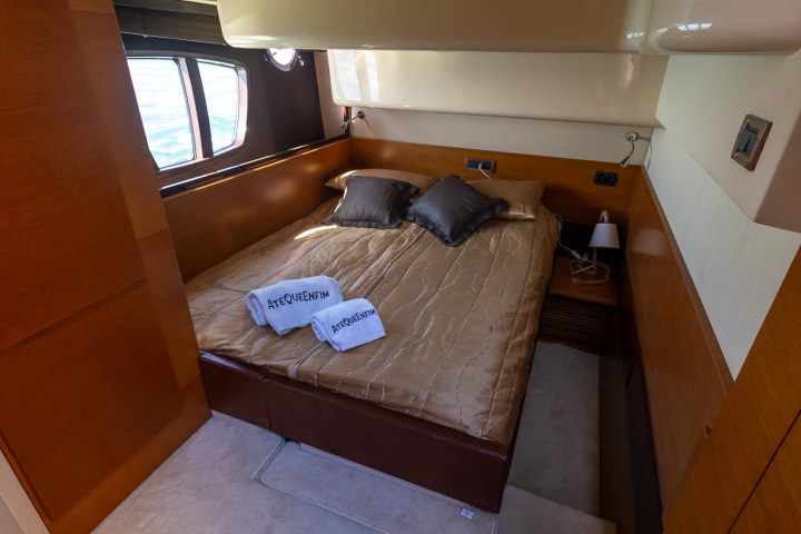 a bedroom with a large window